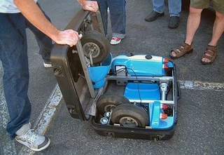 Illustration for article titled It's a Go-Kart That Folds Into a Suitcase. Any Questions?